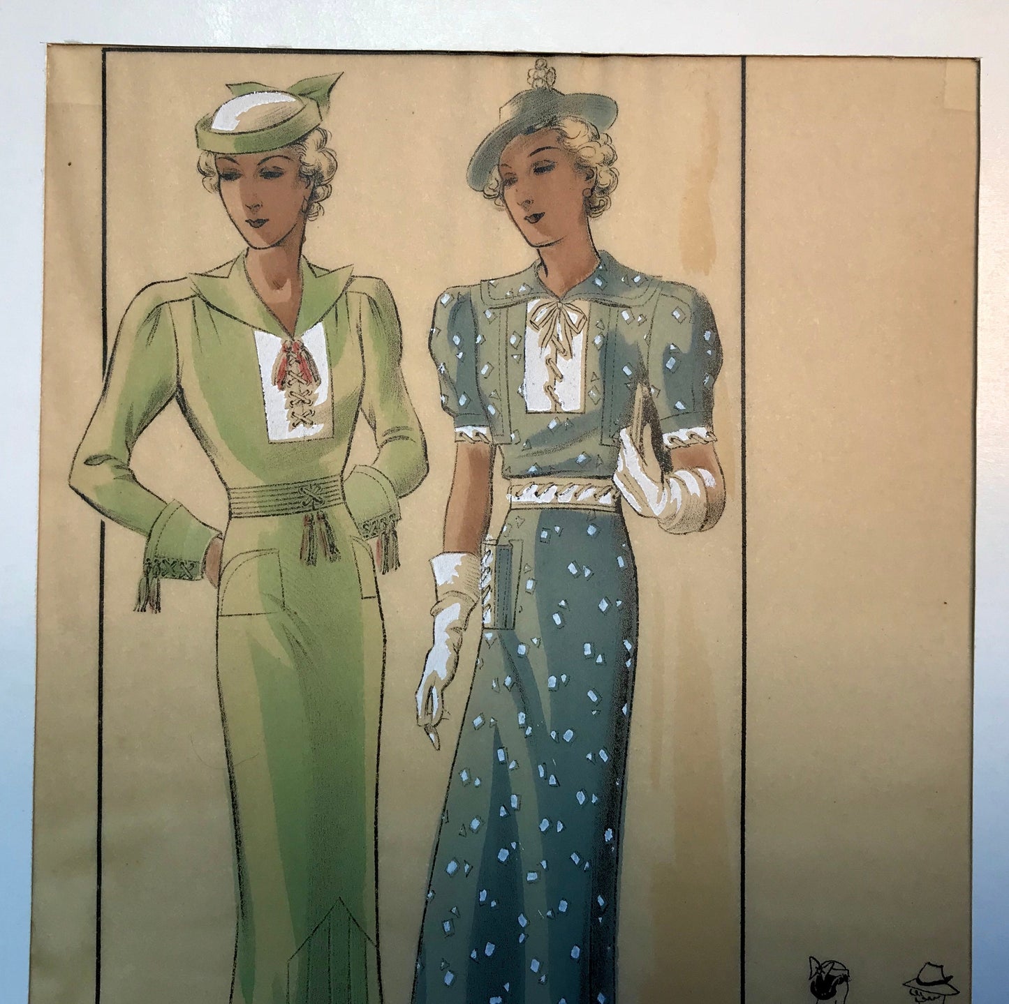 A Sketch, or Croquis. Produced by the Fashion House of Maurice Dubois. Hand coloured lithograph. 1935. Size: 27.5 x 16.7 cms.