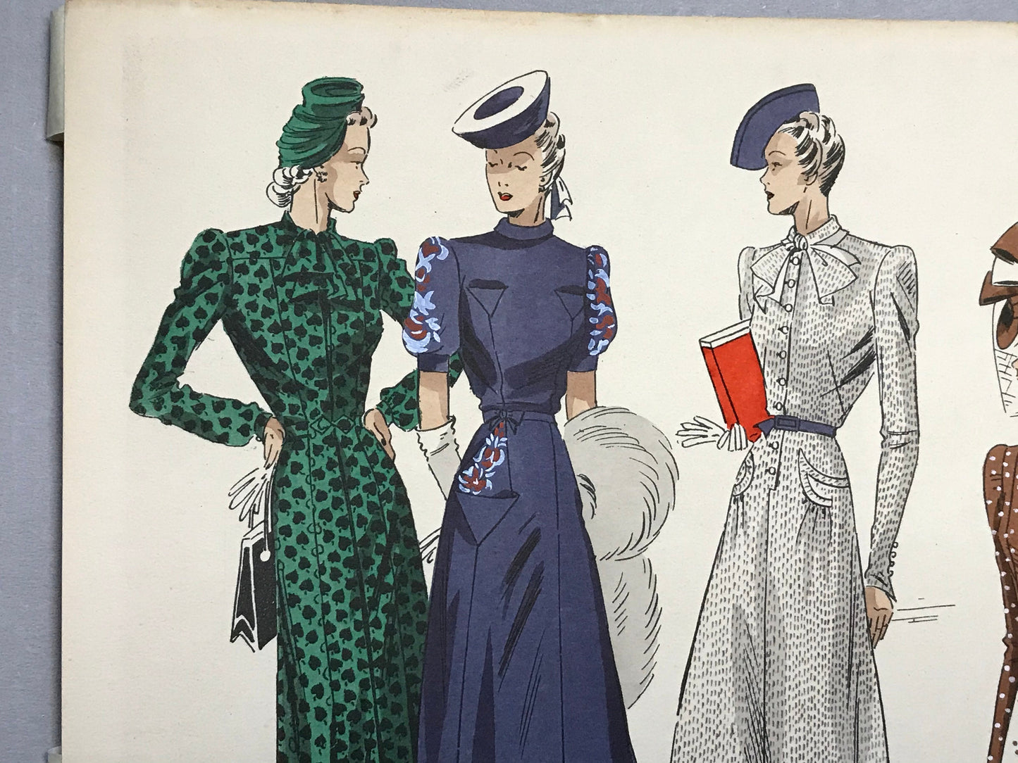An Original Fashion Sketch, or Croquis, from ‘Les Creations Parisiennes’. A Hand Coloured Lithograph Print. 1945. Large: 32.5 x 24.8 cms.