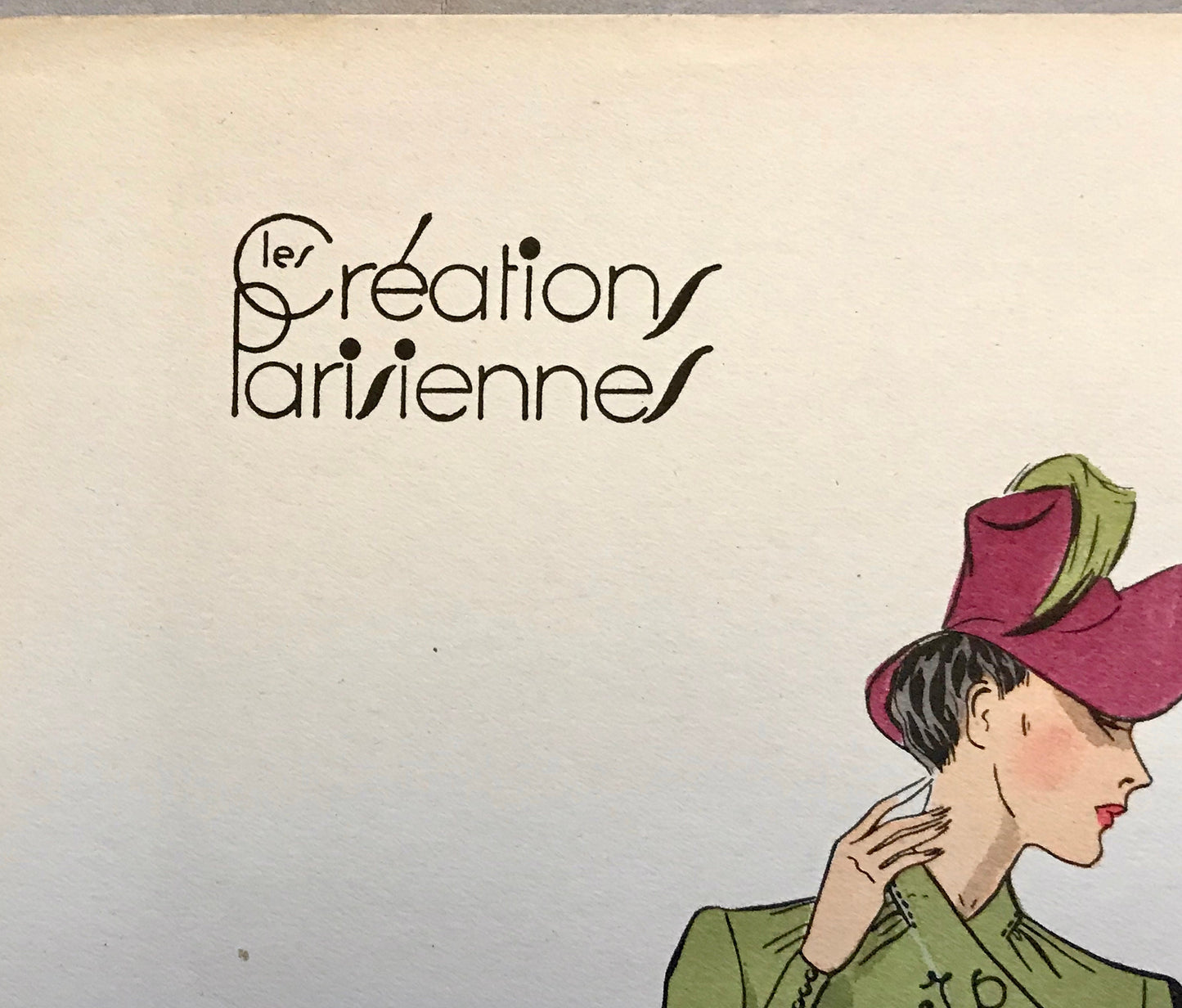 An Original Fashion Sketch, or Croquis, from ‘Les Creations Parisiennes’. A Hand Coloured Lithograph Print. 1945. Large: 32.5 x 24.8 cms.