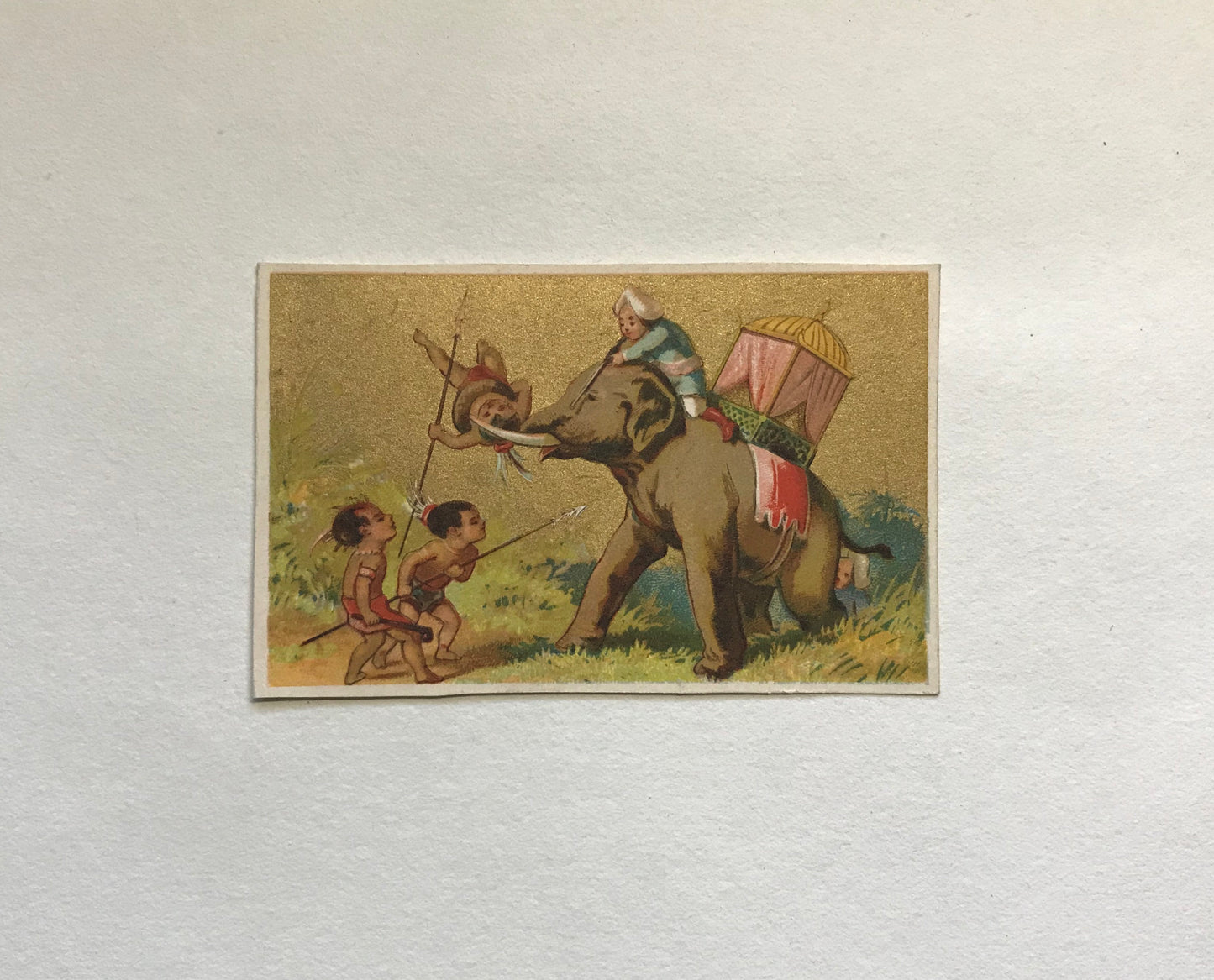 A Set of 6 French Trade Cards. Featuring the adventures of three mahouts and an elephant. Late 19th century. Size: 10 x 6.4 cms.
