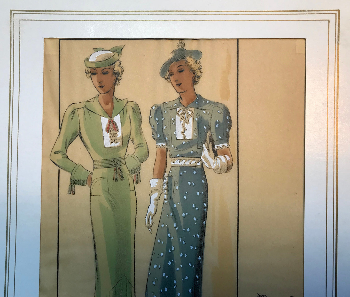 A Sketch, or Croquis. Produced by the Fashion House of Maurice Dubois. Hand coloured lithograph. 1935. Size: 27.5 x 16.7 cms.