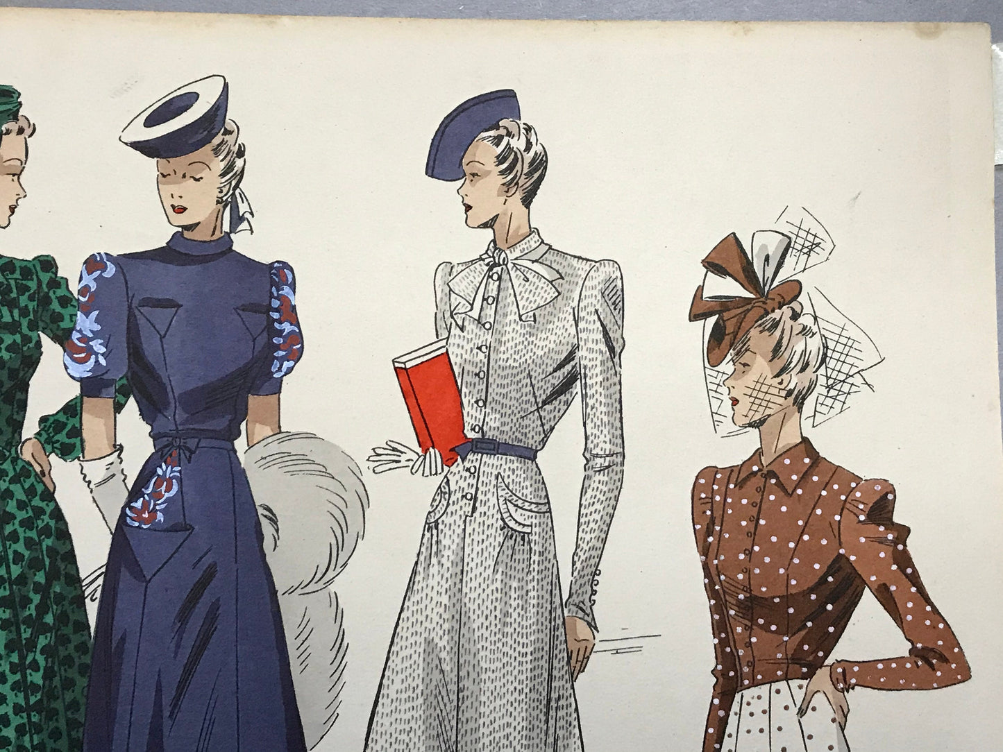 An Original Fashion Sketch, or Croquis, from ‘Les Creations Parisiennes’. A Hand Coloured Lithograph Print. 1945. Large: 32.5 x 24.8 cms.
