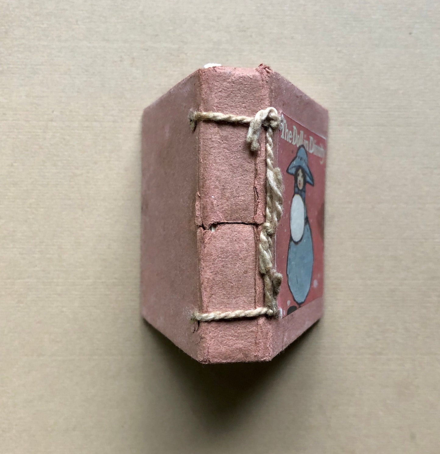 The Doll in Dimity. A Tiny Book in a Slipcase. Published by Humphrey Milford. Undated but known to be 1910. 64 Pages. Size: 6 x 5.5 cms.