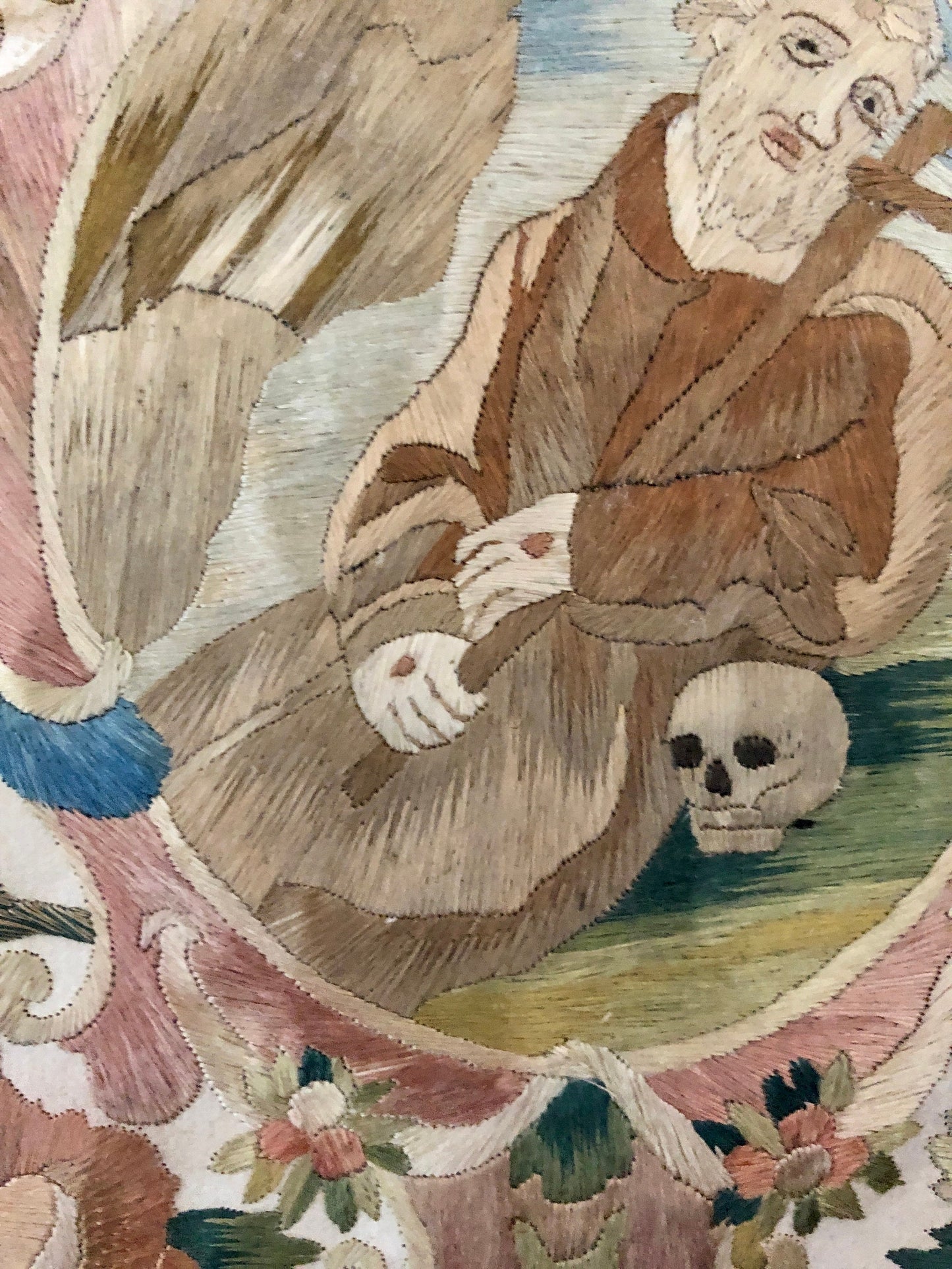 A Fine Silk Double Sided Embroidery of a Saint, Possibly St. Francis, With Skull and Stigmata. French 17th Century. 20 x 16 cms.