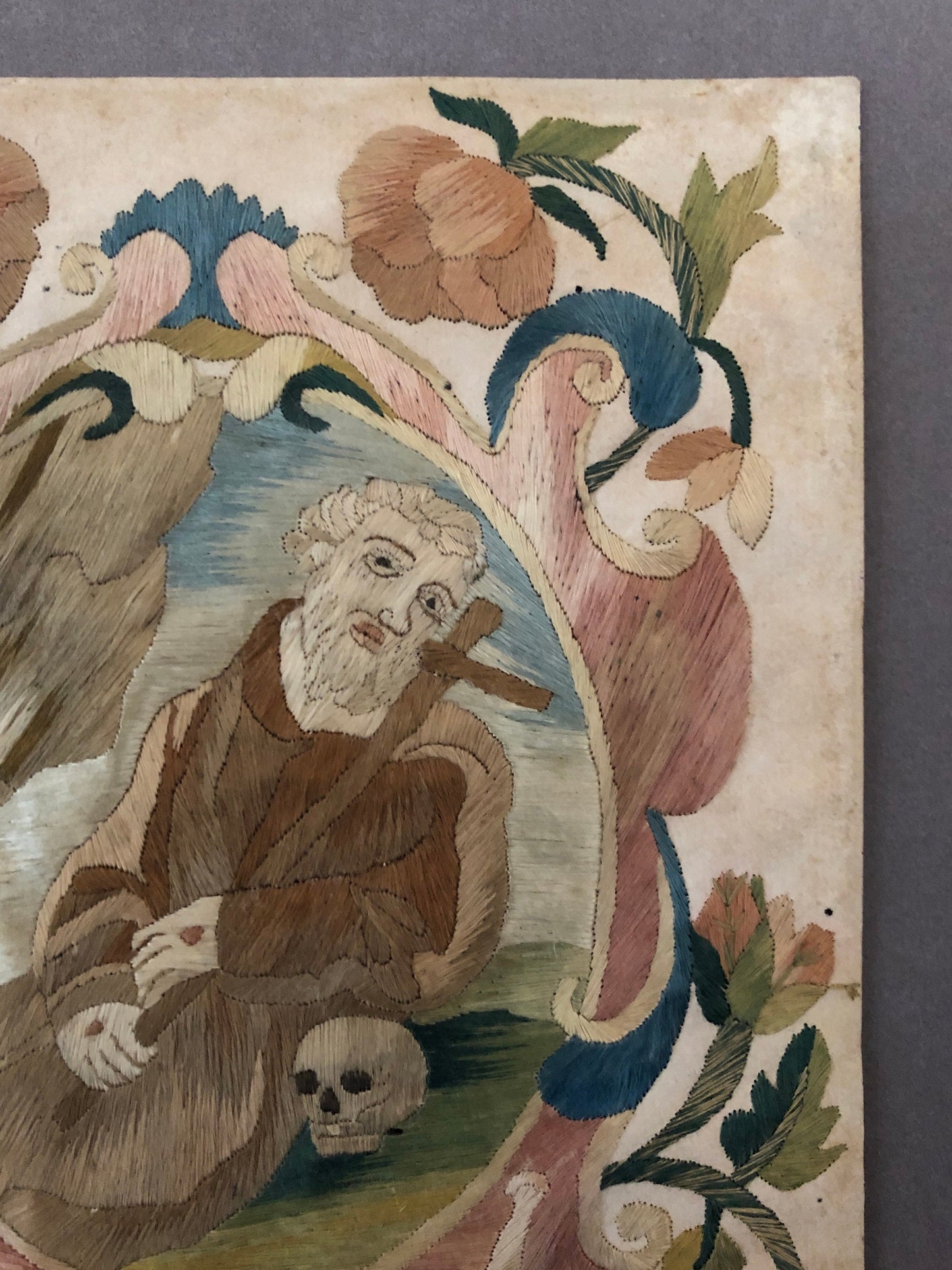 A Fine Silk Double Sided Embroidery of a Saint, Possibly St. Francis, With Skull and Stigmata. French 17th Century. 20 x 16 cms.