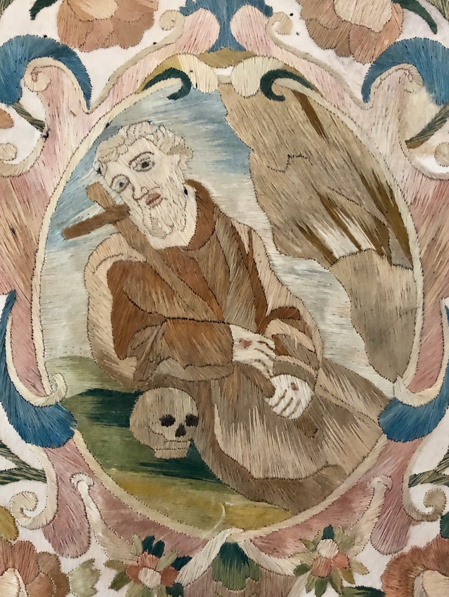 A Fine Silk Double Sided Embroidery of a Saint, Possibly St. Francis, With Skull and Stigmata. French 17th Century. 20 x 16 cms.