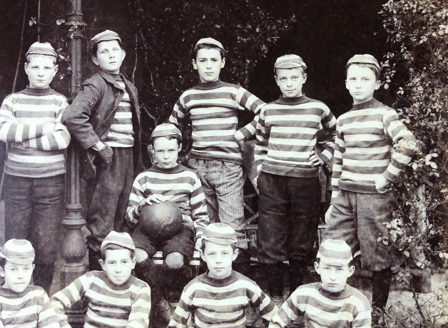 A Large Sepia Coloured Photograph of a Football Team. Byrne & Co. Undated - I assume early 1900’s. Size: 27 x 34 cms. Very Good Condition.