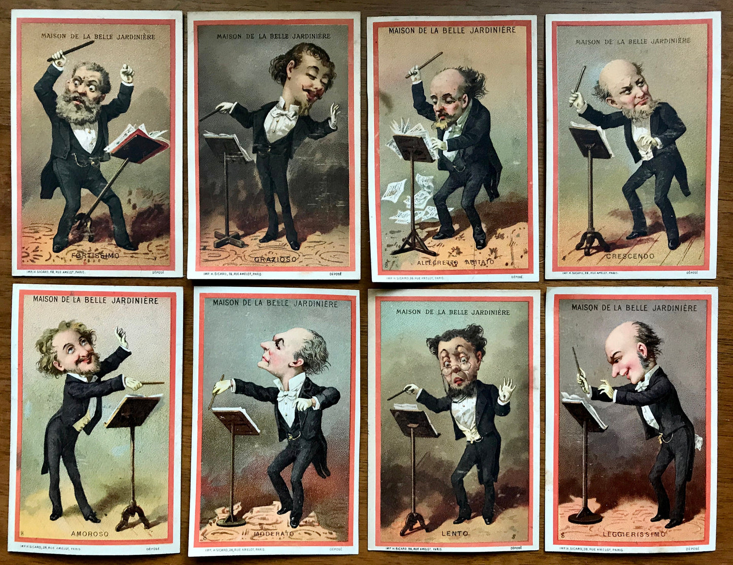 A Set of 8 French Trade Cards. Featuring conductors illustrating the mood of the music played. Dated 1878. Size: 12 x 8 cms.