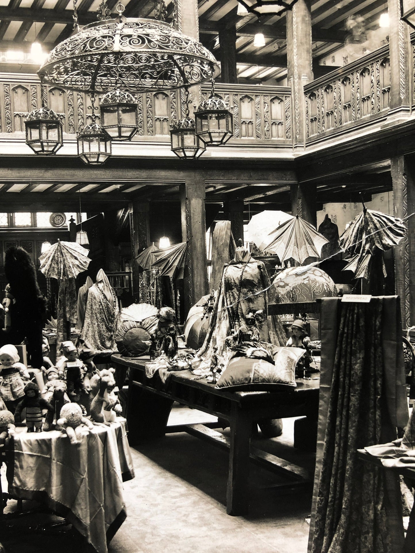 Four Original Sepia Toned Photographs of Liberty Department Store. Exterior and Interior. Dating from the 1920’s. Size: 28.5 x 4 cms.