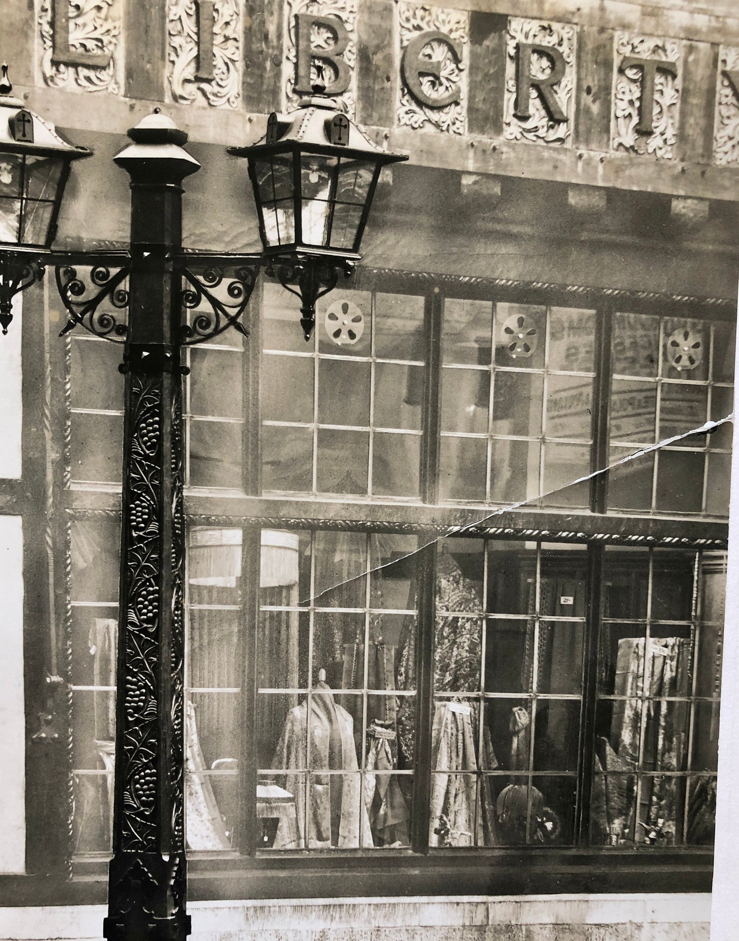 Four Original Sepia Toned Photographs of Liberty Department Store. Exterior and Interior. Dating from the 1920’s. Size: 28.5 x 4 cms.