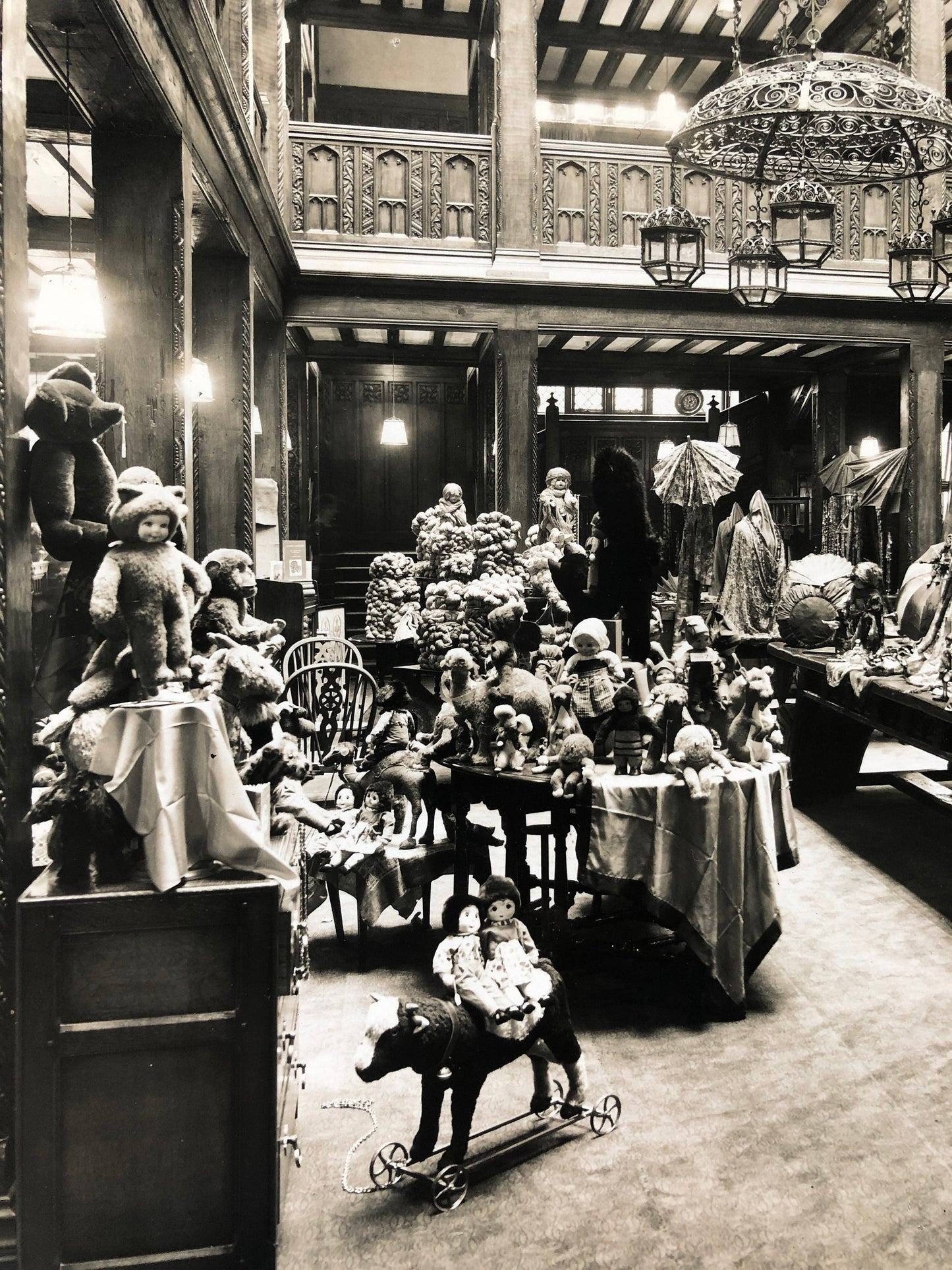 Four Original Sepia Toned Photographs of Liberty Department Store. Exterior and Interior. Dating from the 1920’s. Size: 28.5 x 4 cms.