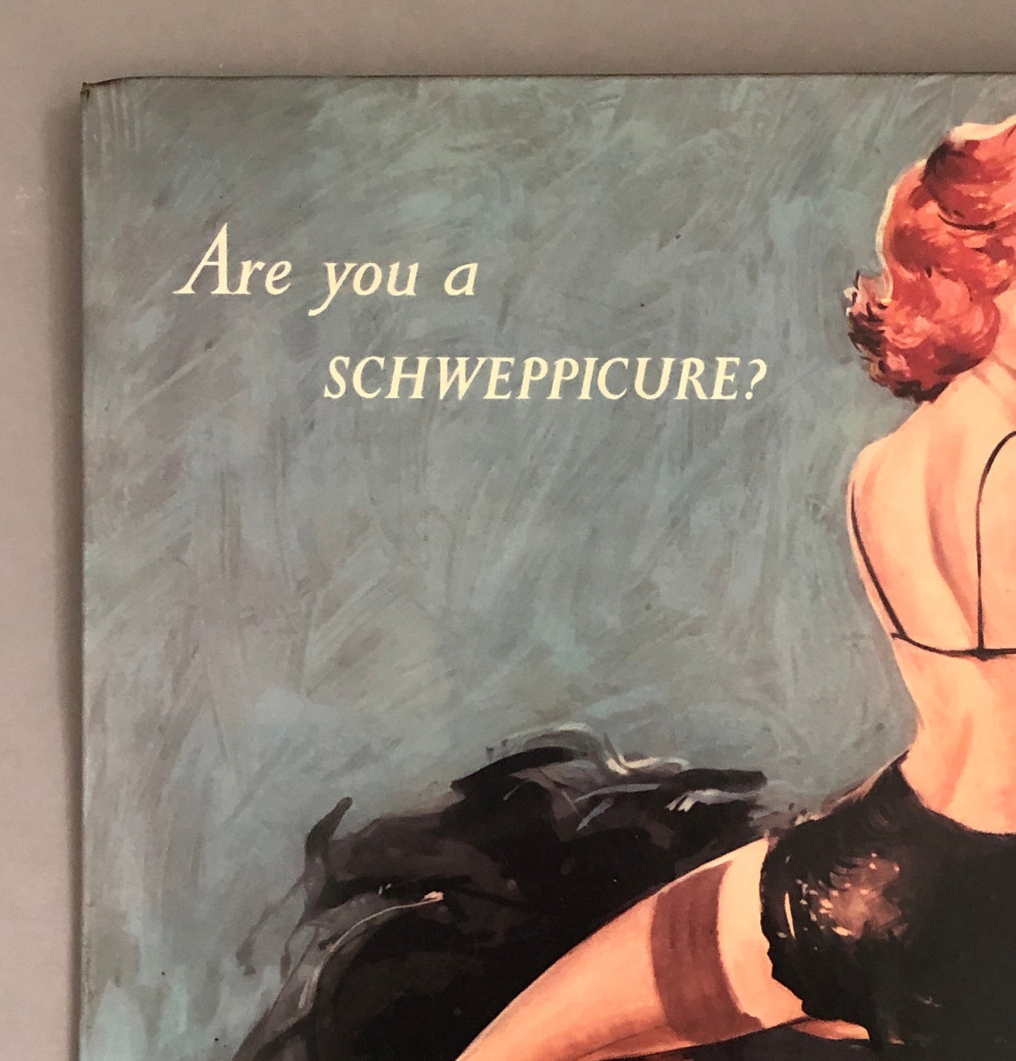 An Original Tin Advertisement For Schweppes Tonic Water. Genuine Vintage Glamour. From the 1950’s. Size: 34 .5 x 29.5 cms.