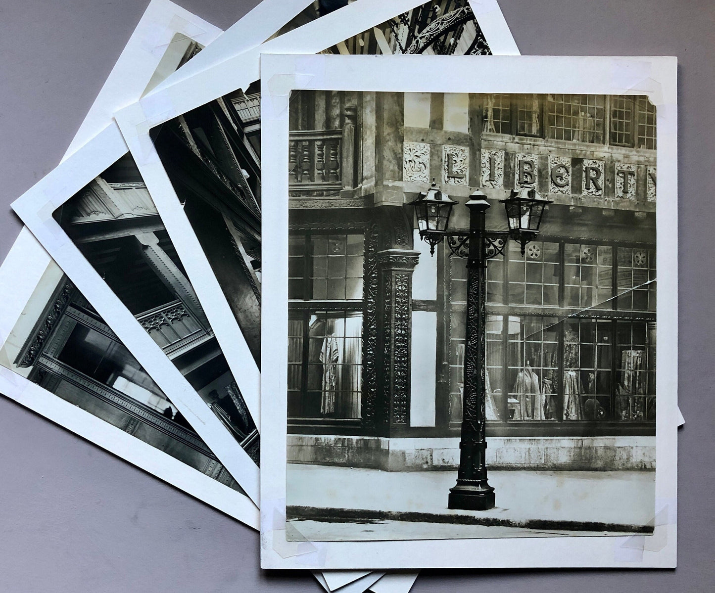 Four Original Sepia Toned Photographs of Liberty Department Store. Exterior and Interior. Dating from the 1920’s. Size: 28.5 x 4 cms.