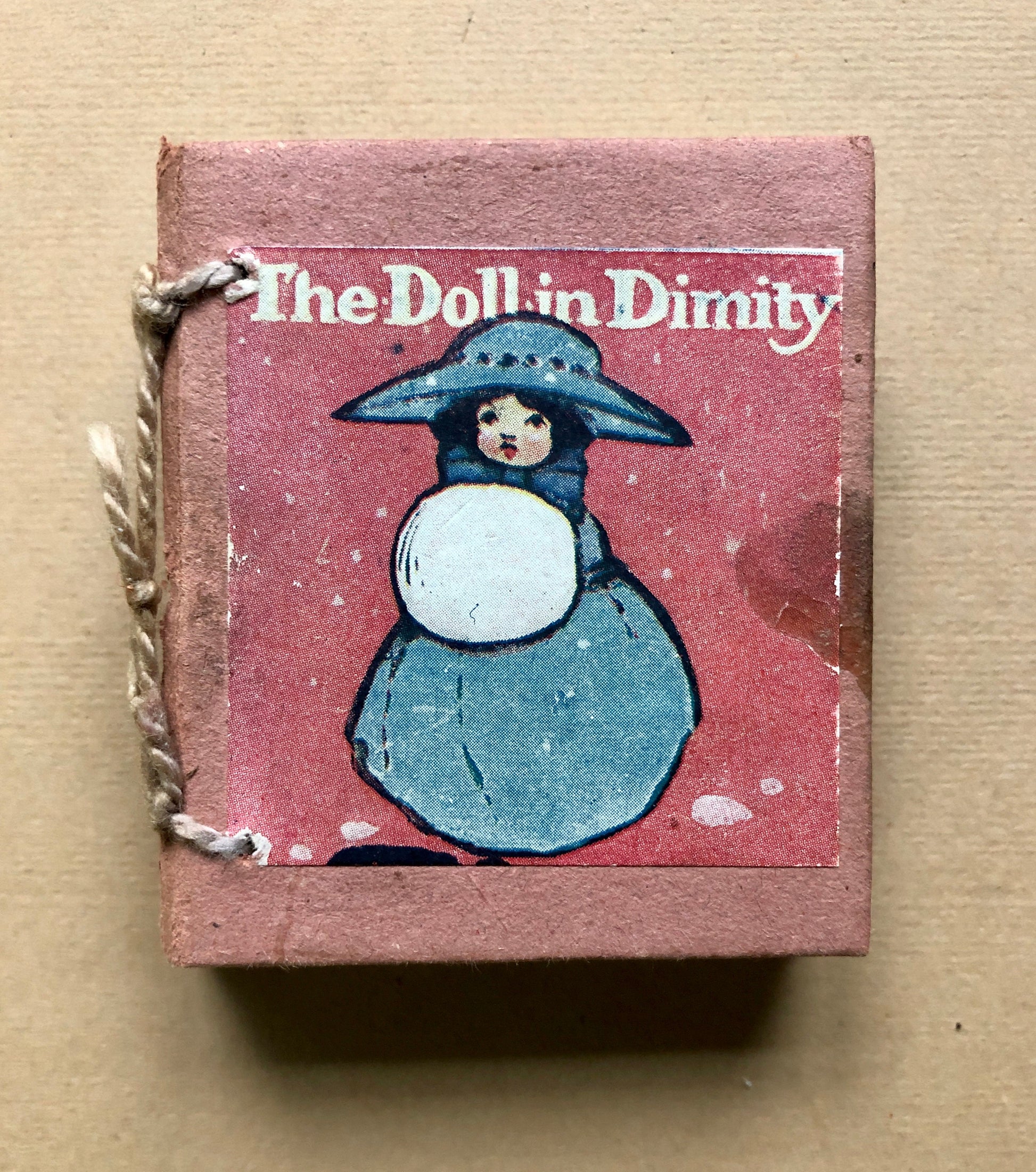 The Doll in Dimity. A Tiny Book in a Slipcase. Published by Humphrey Milford. Undated but known to be 1910. 64 Pages. Size: 6 x 5.5 cms.