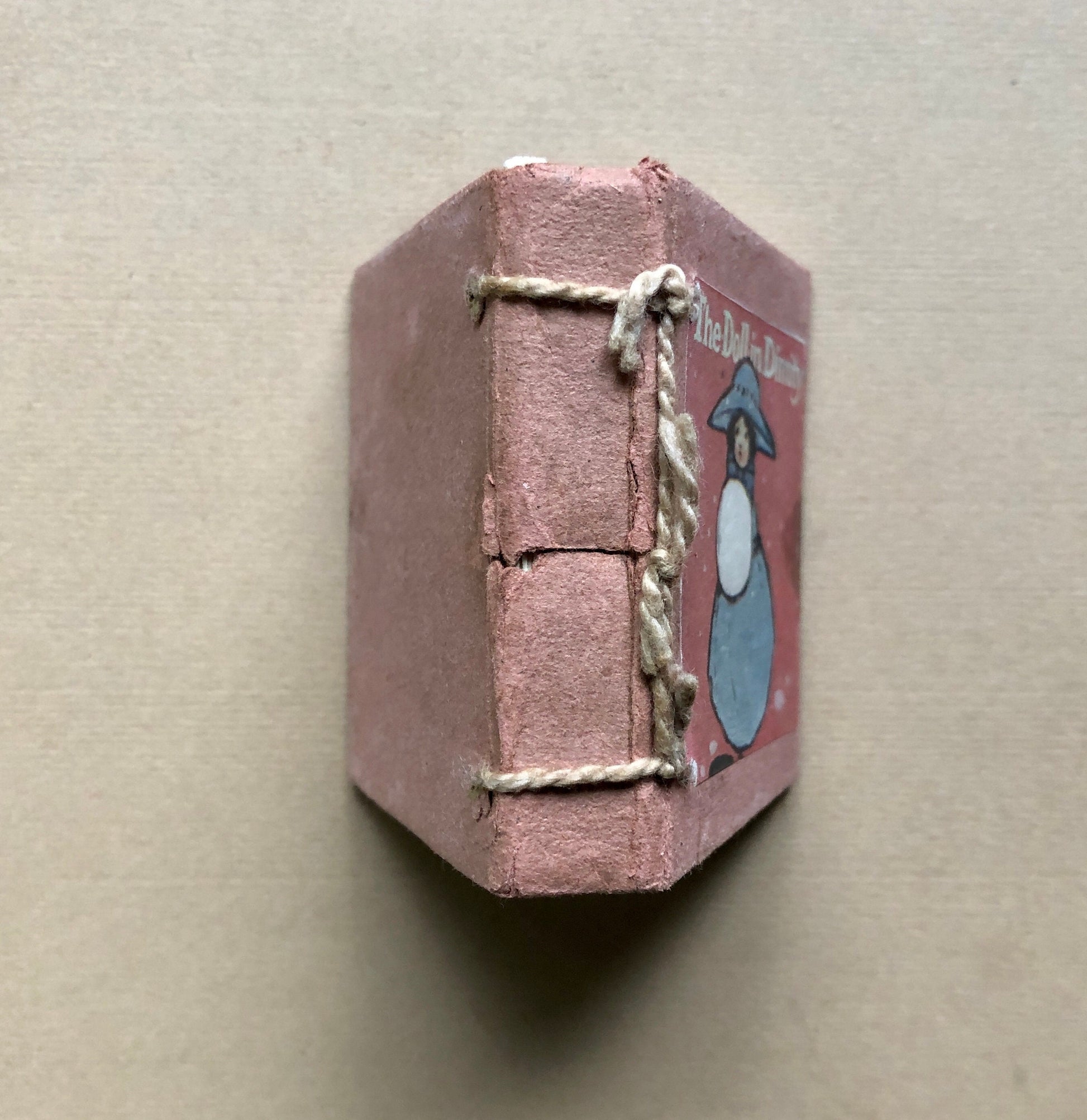 The Doll in Dimity. A Tiny Book in a Slipcase. Published by Humphrey Milford. Undated but known to be 1910. 64 Pages. Size: 6 x 5.5 cms.
