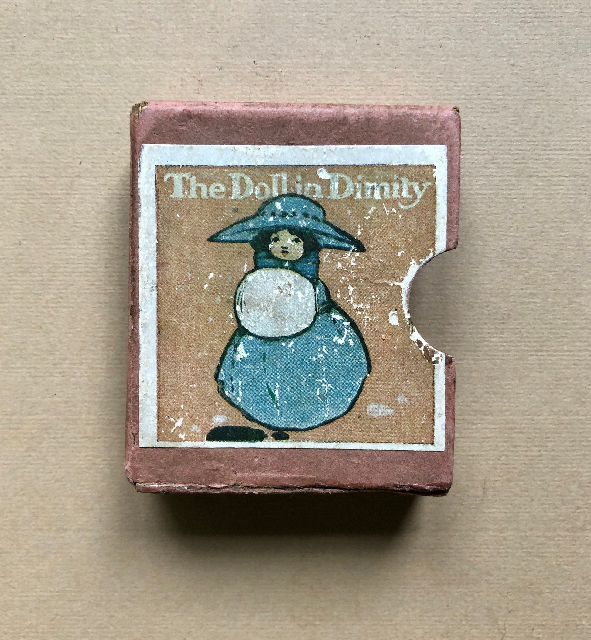 The Doll in Dimity. A Tiny Book in a Slipcase. Published by Humphrey Milford. Undated but known to be 1910. 64 Pages. Size: 6 x 5.5 cms.
