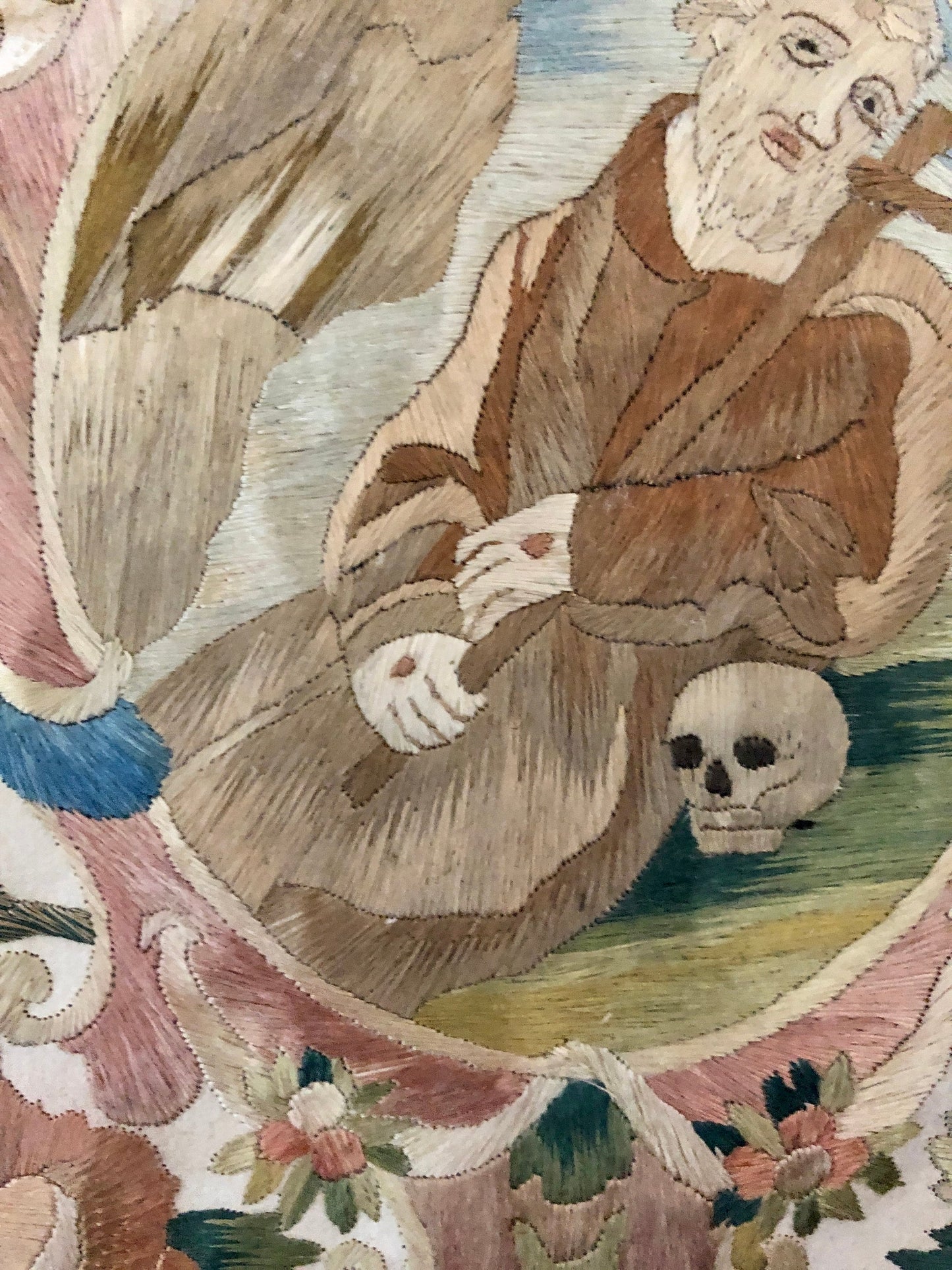 A Fine Silk Double Sided Embroidery of a Saint, Possibly St. Francis, With Skull and Stigmata. French 17th Century. 20 x 16 cms.