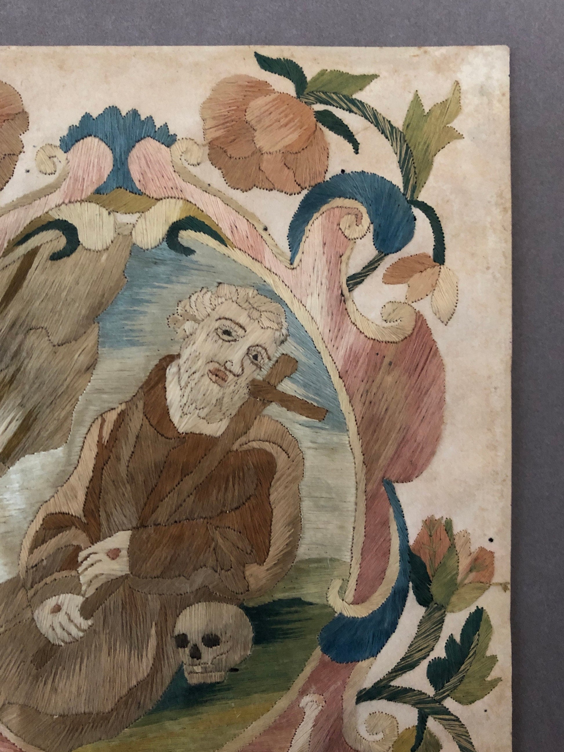 A Fine Silk Double Sided Embroidery of a Saint, Possibly St. Francis, With Skull and Stigmata. French 17th Century. 20 x 16 cms.