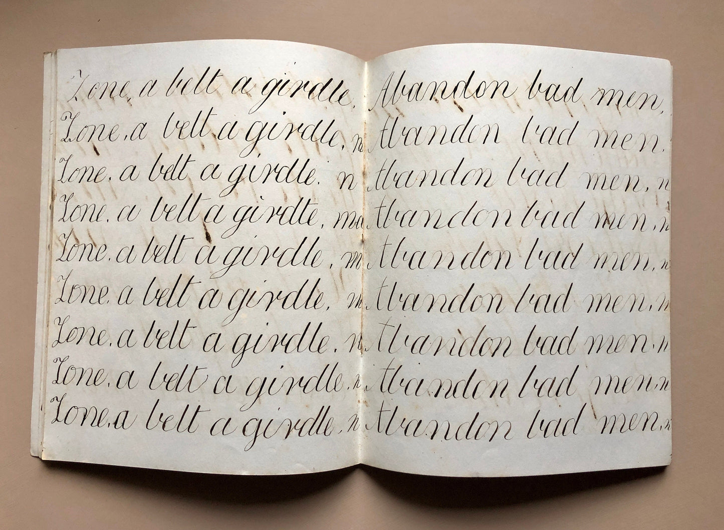 Calligraphy. An Exercise Book in Which Master George Thomas Webster White Practices Penmanship. Dated 1853. 48 pages. Size: 22.7 x 18.3