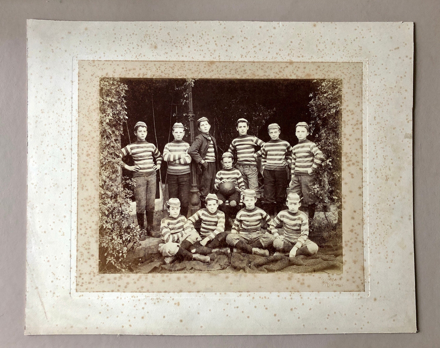A Large Sepia Coloured Photograph of a Football Team. Byrne & Co. Undated - I assume early 1900’s. Size: 27 x 34 cms. Very Good Condition.