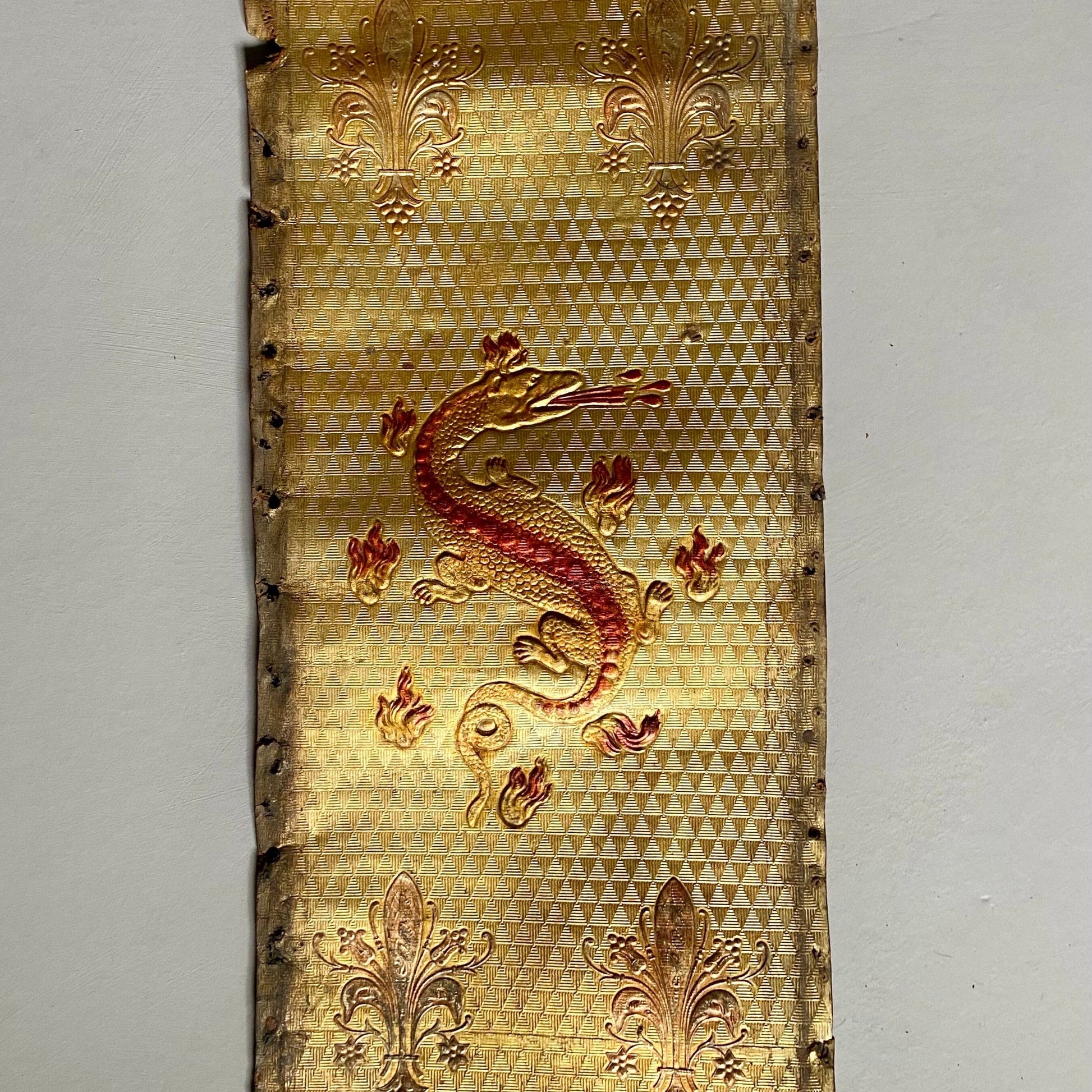 Two Long Lengths of Gilded Antique Leather Decorated With Bronze Dragons and Siver Fleur de Lis. French. Size: 9.5 meters in length.