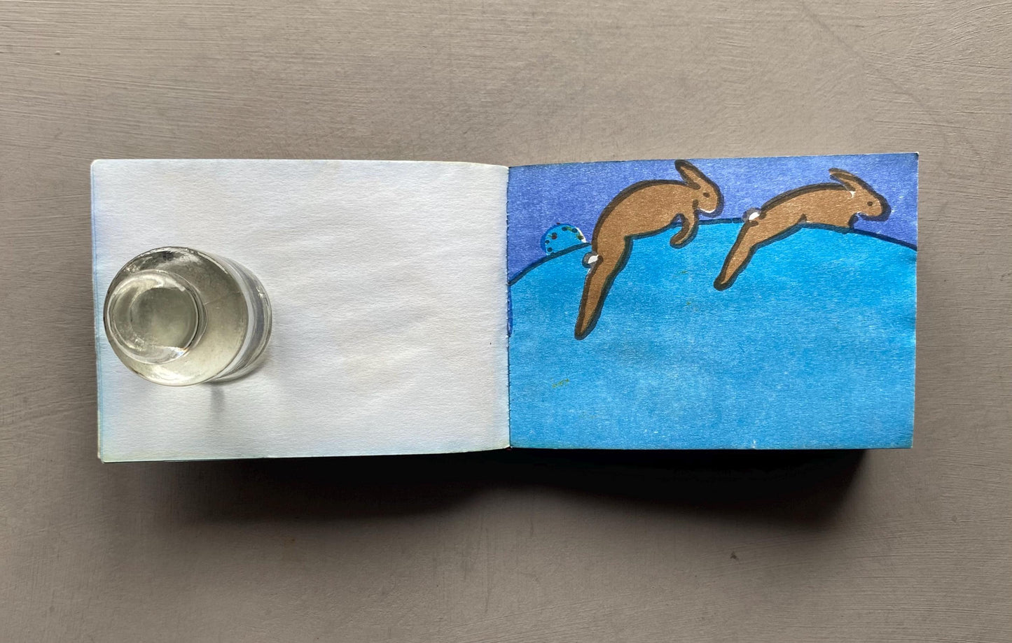Rapid Rabbits by Henrietta Van Egten. Signed. A Limited Edition 1/300. 83 Tiny Pages. Published by Vossforlag in 1996. Size: 6.5 x 9 cms