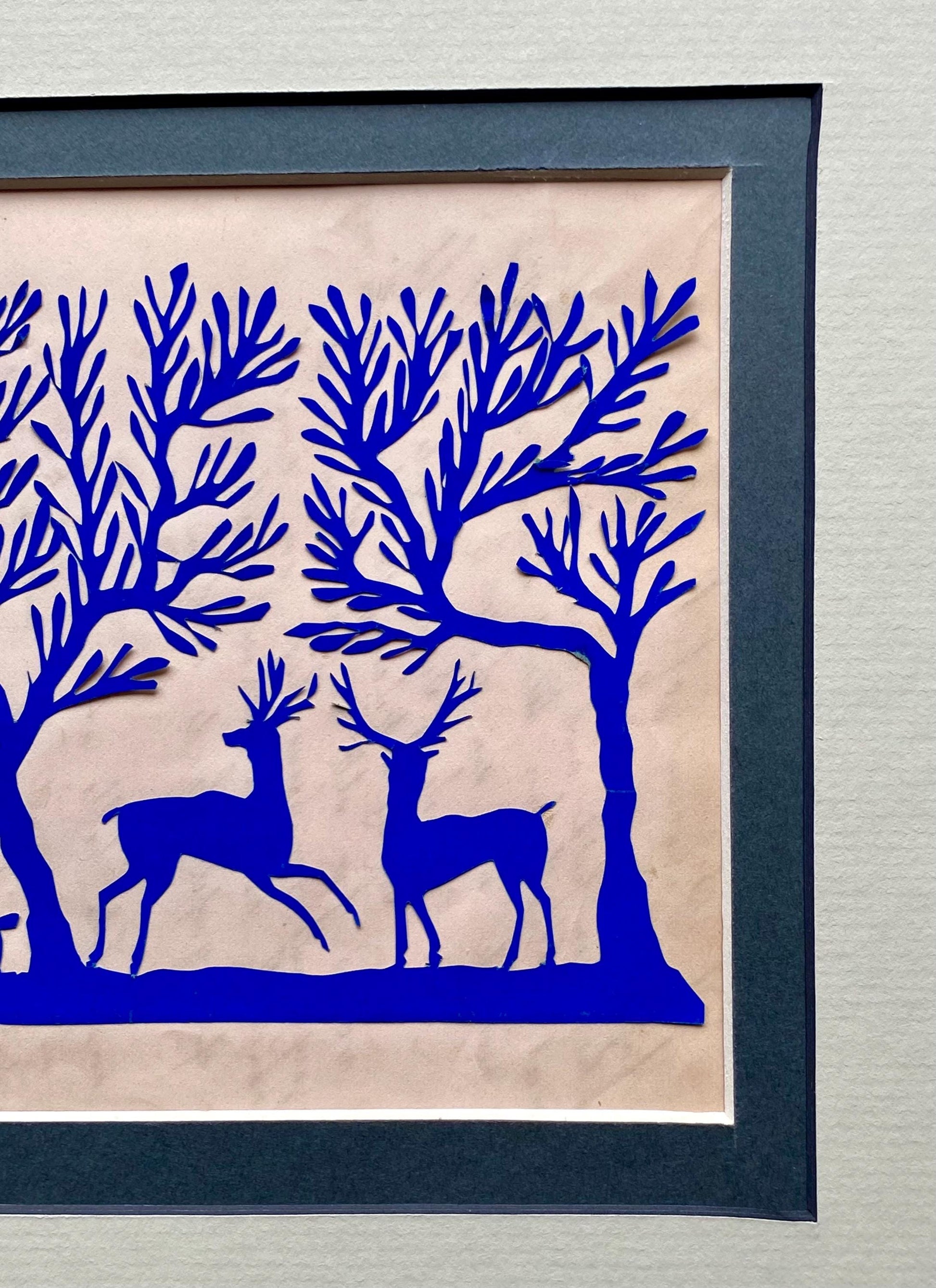 An Antique Paper Cut. Deer In a Wood. Blue on a Pale Pink Ground. Late Georgian, Early Victorian. Size: 12.7 x 21.5 cms.