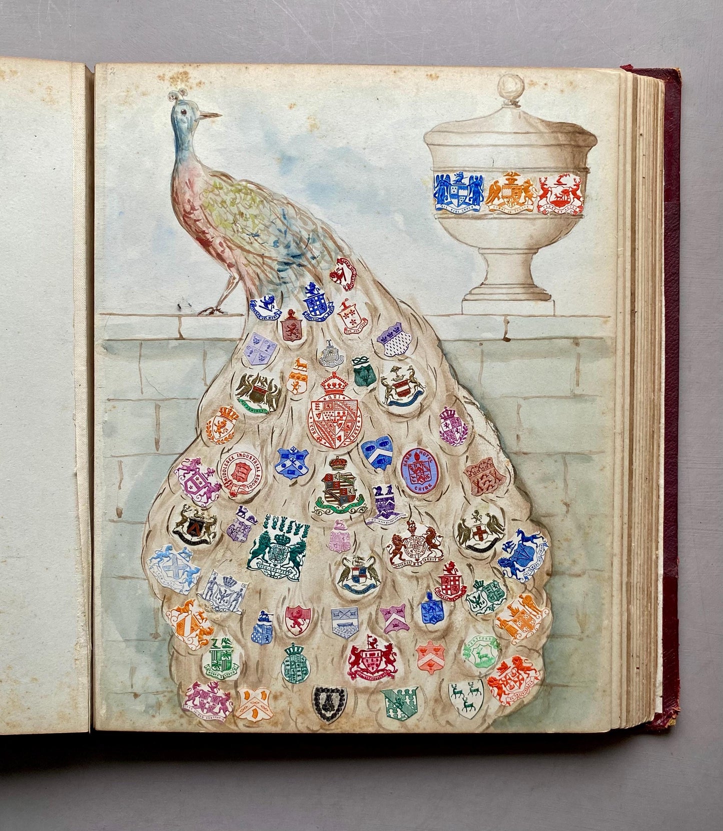 A Crest Album Containing 27 decorated Hand Drawn and Painted Watercolour Images. Undated: Likely 32 x 25 cms.