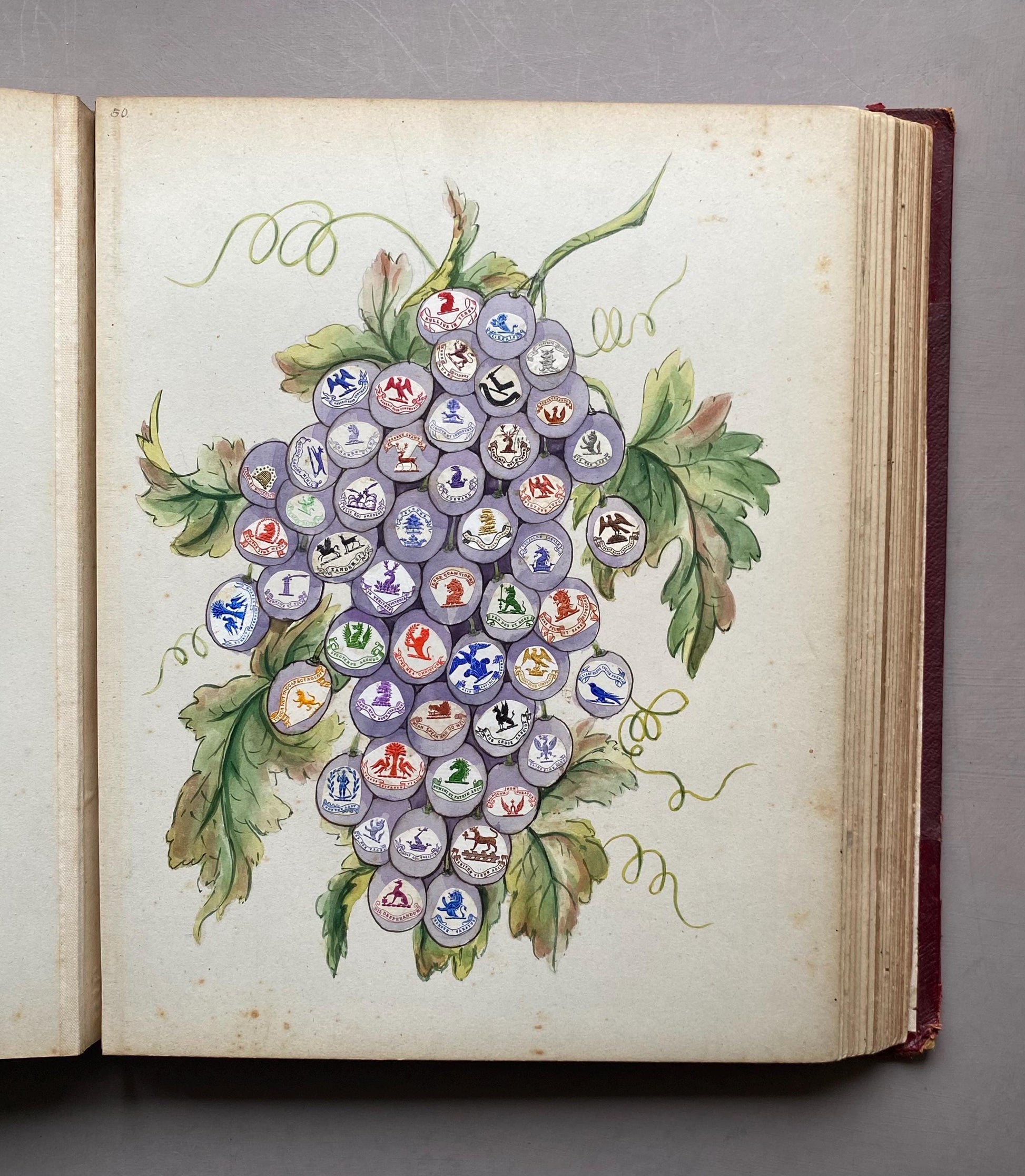 A Crest Album Containing 27 decorated Hand Drawn and Painted Watercolour Images. Undated: Likely 32 x 25 cms.