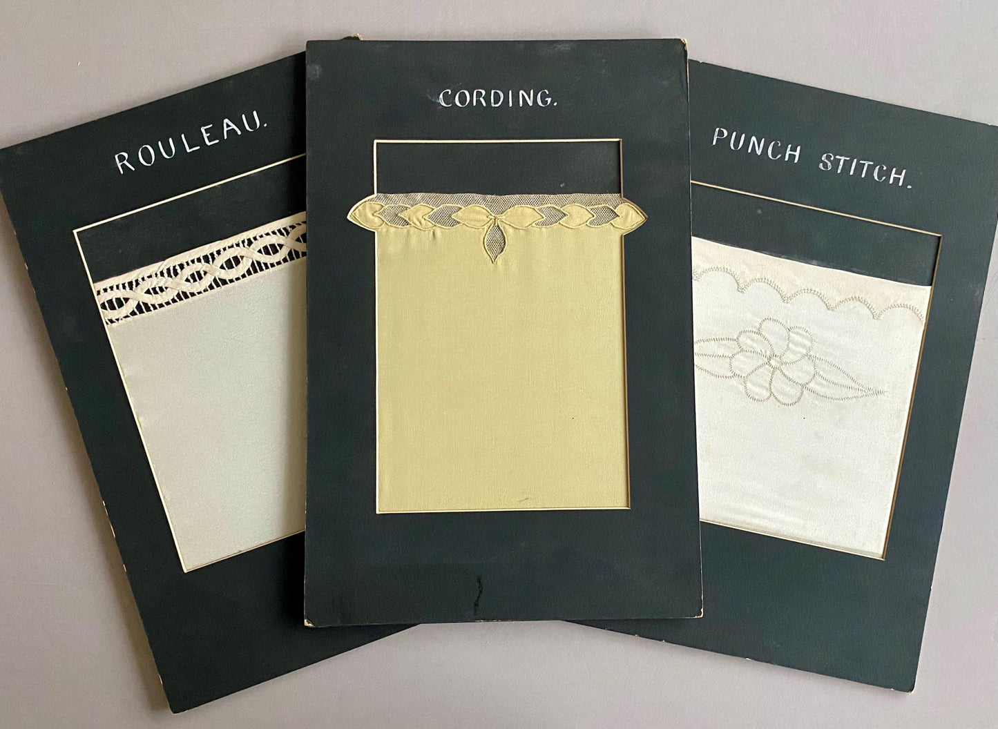 Three Finely Stiched Samples of Needlework. Possibly 1930s. Size: 25.5 x 38 cms.