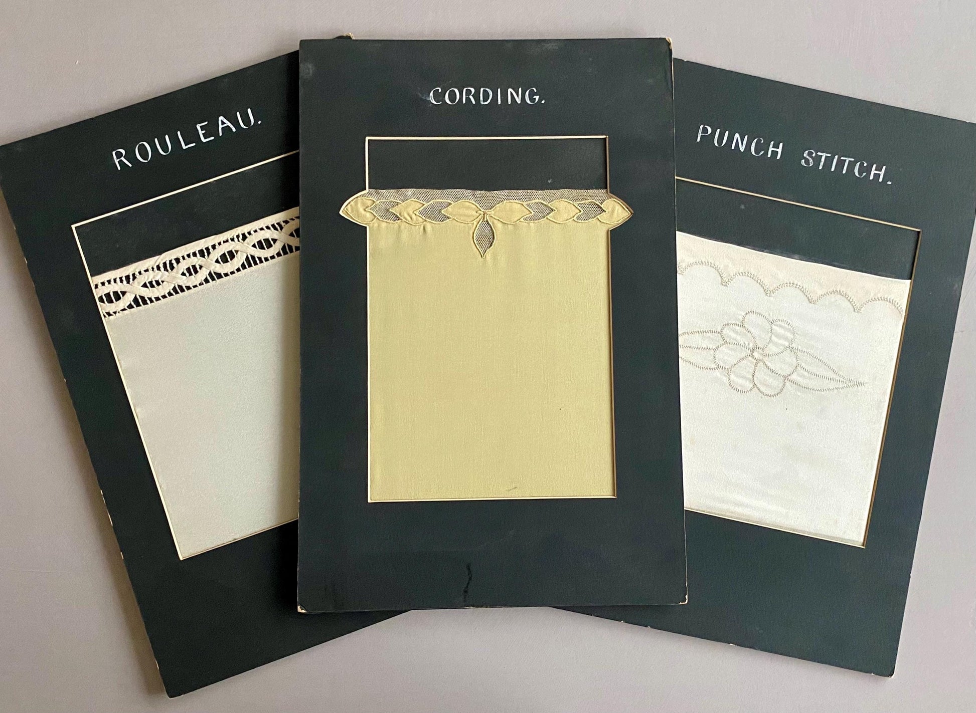 Three Finely Stiched Samples of Needlework. Possibly 1930s. Size: 25.5 x 38 cms.