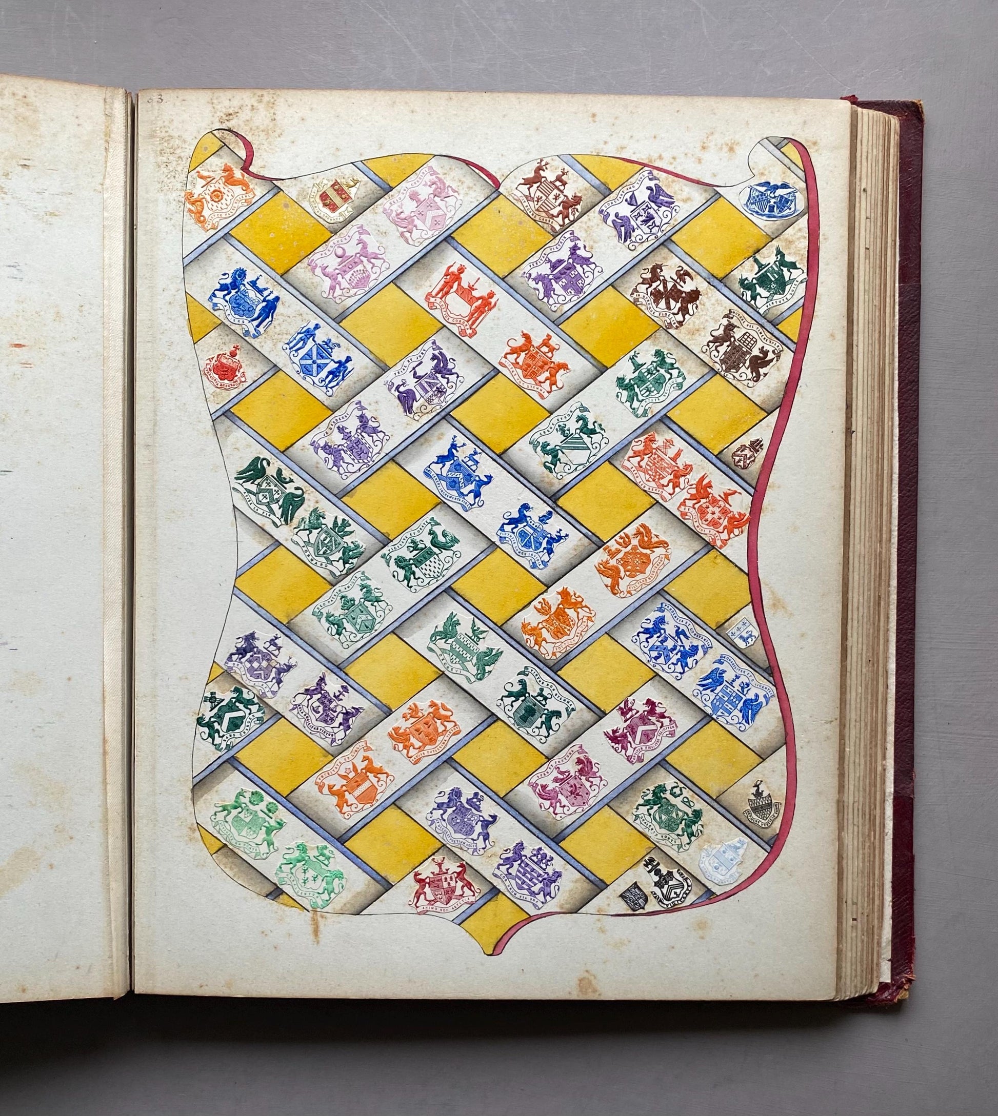 A Crest Album Containing 27 decorated Hand Drawn and Painted Watercolour Images. Undated: Likely 32 x 25 cms.