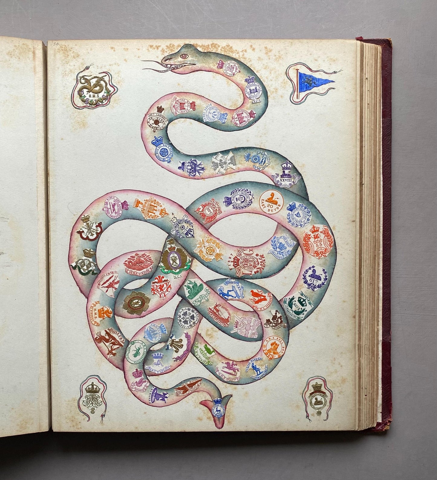 A Crest Album Containing 27 decorated Hand Drawn and Painted Watercolour Images. Undated: Likely 32 x 25 cms.