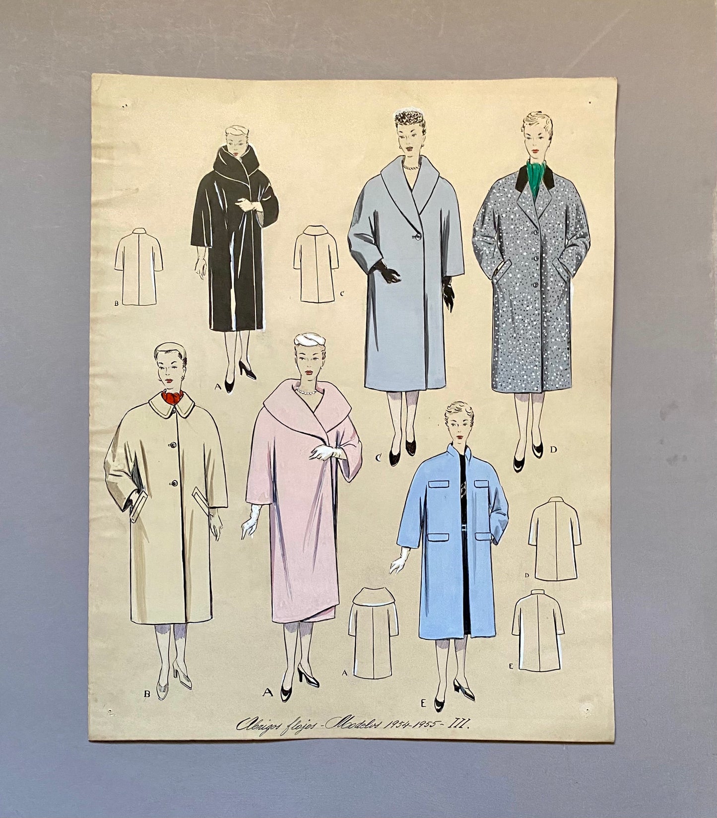 May include: A vintage fashion illustration featuring nine different coat designs for women. The coats are in various colors and styles, including black, blue, pink, and beige. The illustration is titled "Châpeaux, Jupes, Manteaux 1949-1955 - III."
