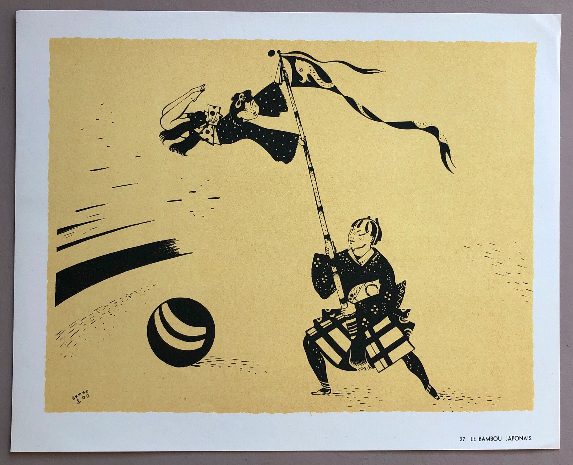 May include: A black and white illustration of a person holding a flag with a fish design. The person is wearing a traditional Japanese outfit and is standing on a yellow background. The text "27 LE BAMBOUS JAPONAIS" is at the bottom of the image.