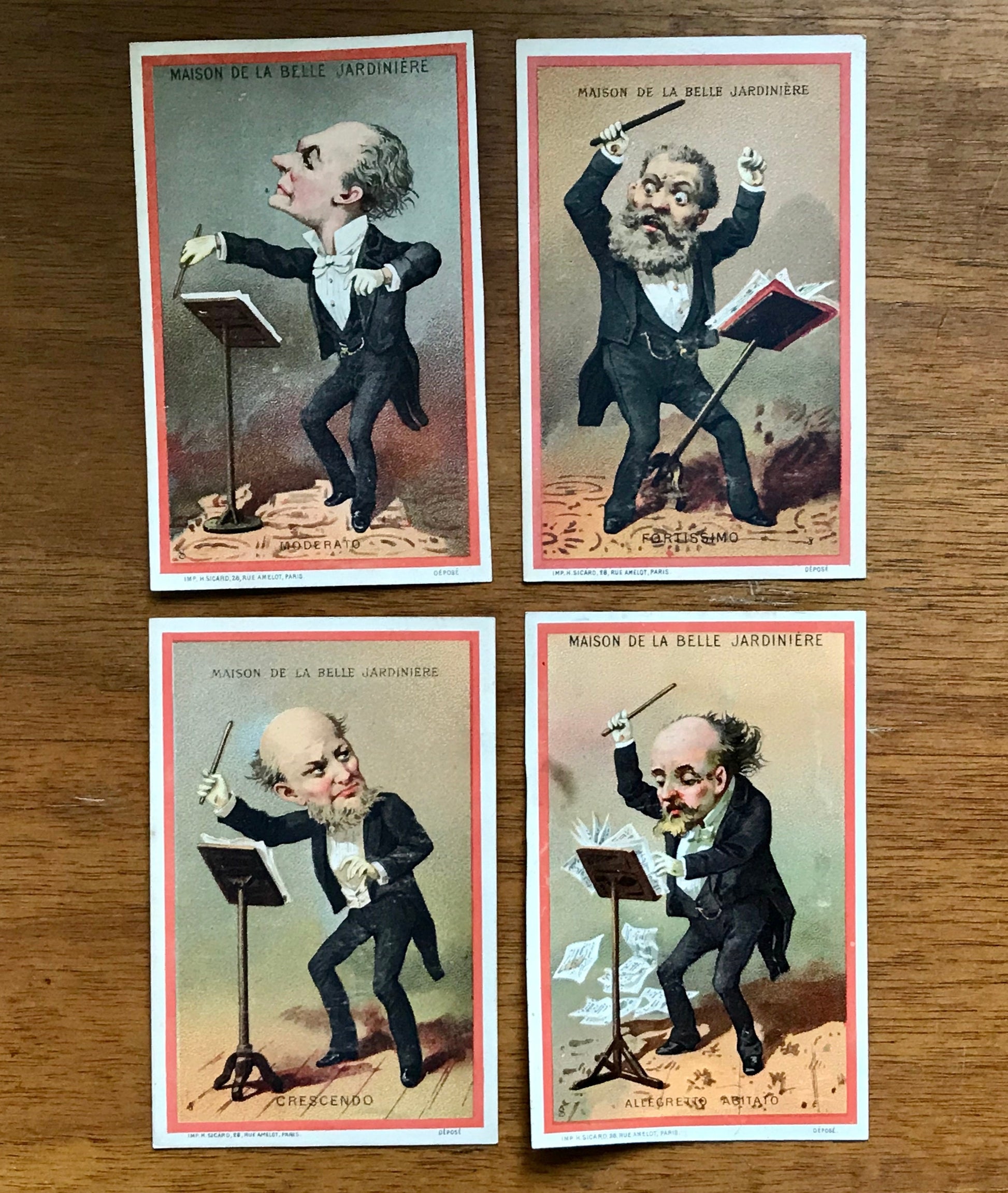 A Set of 8 French Trade Cards. Featuring conductors illustrating the mood of the music played. Dated 1878. Size: 12 x 8 cms.